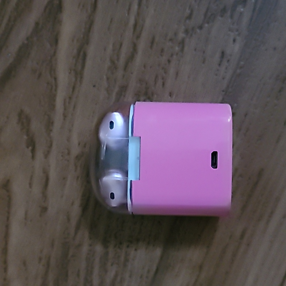 Pink earbuds. Can be used with both androids and iphones.